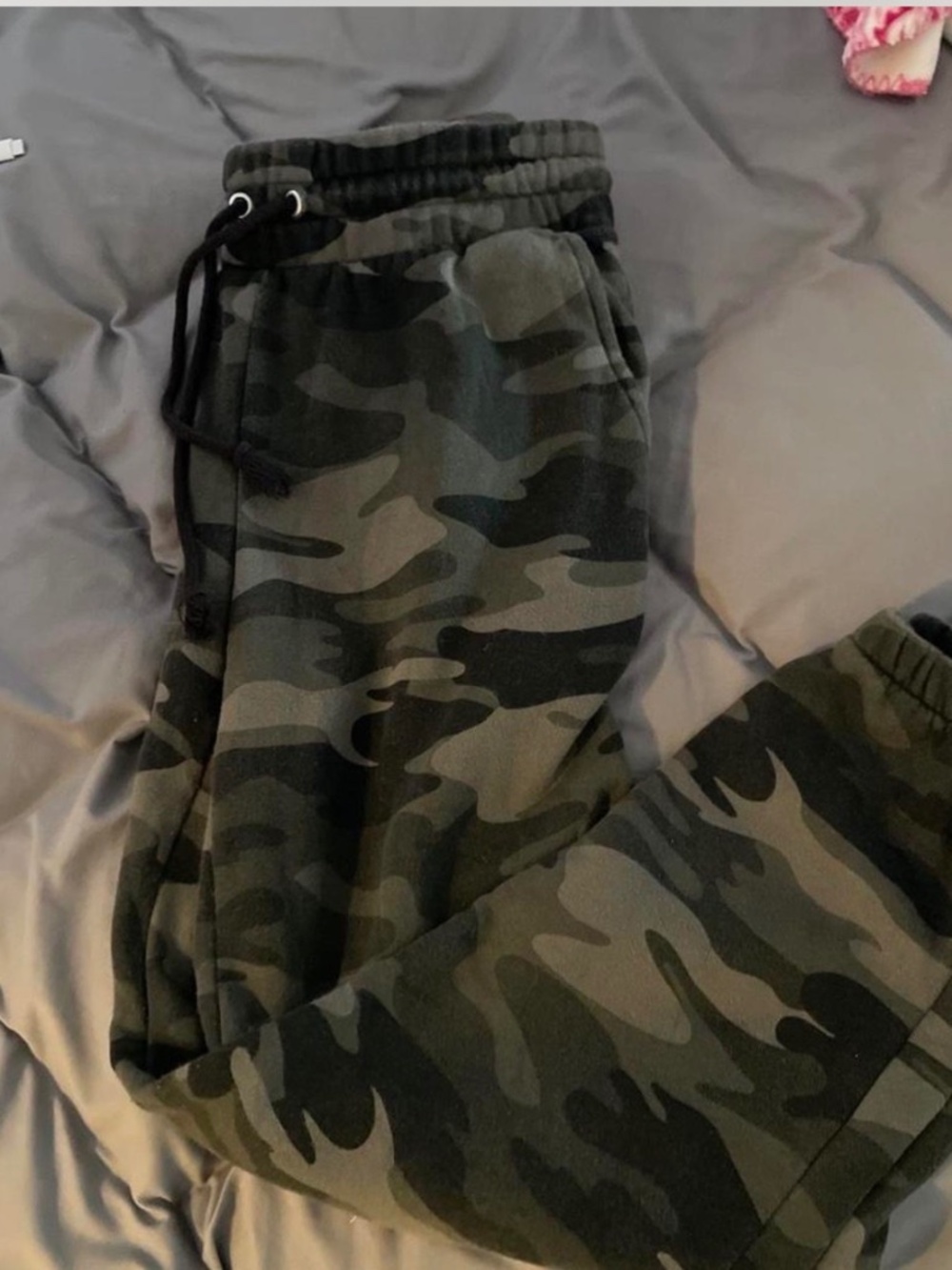 Green and black camo sweatpants